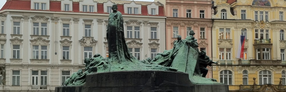 The Jan Hus Memorial on the Old Town Square of Prague is built atop the place where the witch Fen'ka is lynched by the mob in the opening pages of "Come Hell or High Water."